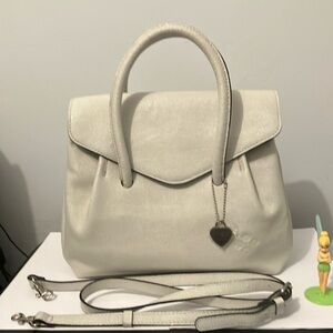 Patricia Nash elegant handbag and Crossbody cream Leather, silver tone feet.